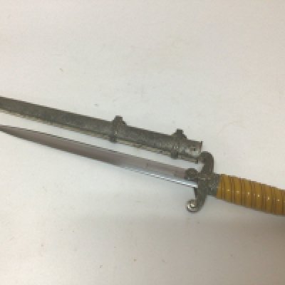 A German Third Reich II world war Luftwaffe officer&rsquo;s presentation dagger. The blade stamped FW Holler Solingen.