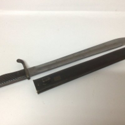 A German 98/05 pattern bayonet the hook quillion number stamped 429 the blade with inscription of maker Fichtel & Sachs Schwenfurt. With a metal scabbed. Very good condition in keeping with age original.