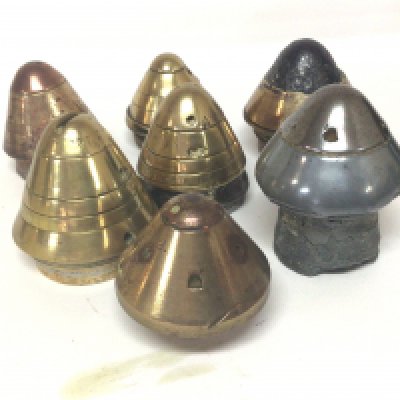 A collection of brass Military I and II world war shell heads many with marks numbered dial rings etc (7)