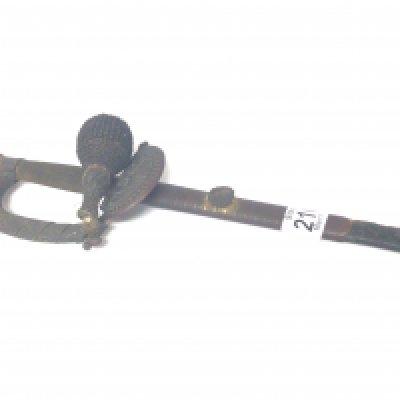 An antique dress sword possible Masonic with an etched blade and brass grip with knight pommel maker E T Hurkle soho London.