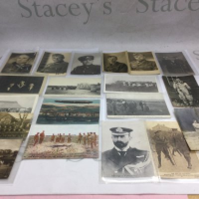 A box of military postcards and photos from both World Wars. Shipping category B.