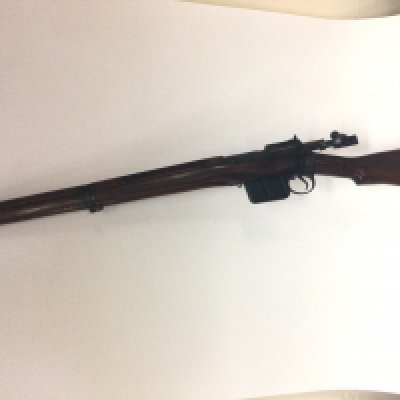 A Vintage Enfield Rifle caliber bolt action with standard Sterling magazine full length stock cal 7.62mm The gun in good functionality condition and maintains original stock patina. Serial number CO 89-065 A FIRE ARMS LICENSE IS REQUIRED TO BID AND BUY THIS LOT.VIEWING AND COLLECTION BY APPOINTMENT ONLY.
