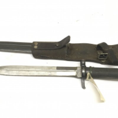 A Swidish 1896 pattern bayonet with leather frog blade stamped with makers marks EJ AB