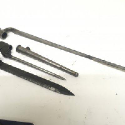 A 19th century spike socket bayonet with Middle Eastern marks a pig stick bayonet and scabbard and one other bayonet (3)