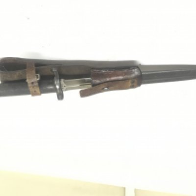 A Swedish 1890 pattern bayonet with leather frog the blade with makers stamp.