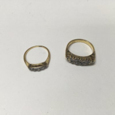 Two 18ct ladies rings set with white stones. Approx weight 7.63 grams.