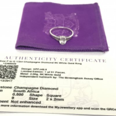 WITHDRAWN - A 9 carat white gold Champagne diamond set ring, size N. Postage category A