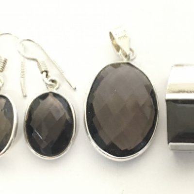Silver Smokey Quartz pendants and earrings. Postage category A
