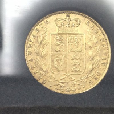 A 1854 young head Victoria shield back full sovereign with box and COA.