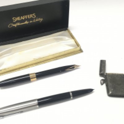 A Sheaffers pen with 14k tip and a Parker pen along with a hallmarked silver vesta. Postage B