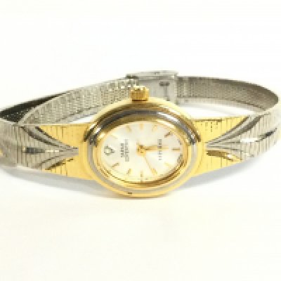 A Sarah Coventry watch, postage category A
