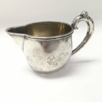 A silver Russian hallmarked jug, marked with 84.