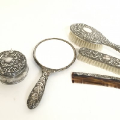 Silver hallmarked dress set including mirrors, brushes etc. This lot cannot be posted