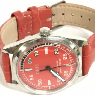 A vintage Red dial Oris mens watch. Postage category A