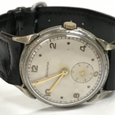 A Helvetia German 1940s military wristwatch No D40216H. This lot cannot be posted