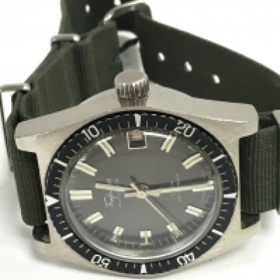 A Trafalgar 5 ATM date Gents automatic wristwatch with illuminous hands on a green nato strap, Circa 1970s. This lot cannot be posted