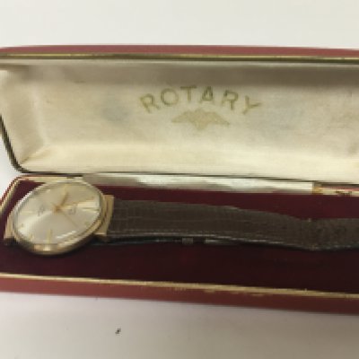 A 9carat Gents Rotary 17jewel manual wind wrist watch seen working and with box.