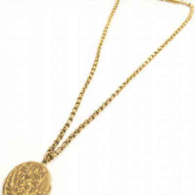 A 15ct gold chain and 15ct gold locket pendant. Total weight 13.5g Postage category a