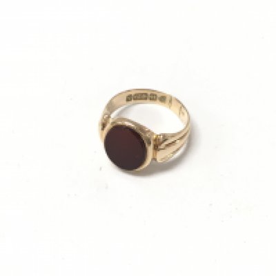 A 15ct signet ring set with a blood stone. Size N, Approx weight 4.3 grams.