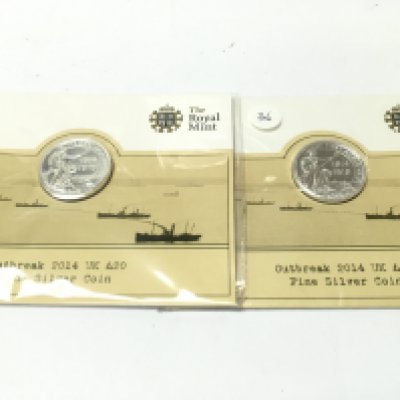 Two silver royal mint 2014 20 pound coins. Postage A NO RESERVE