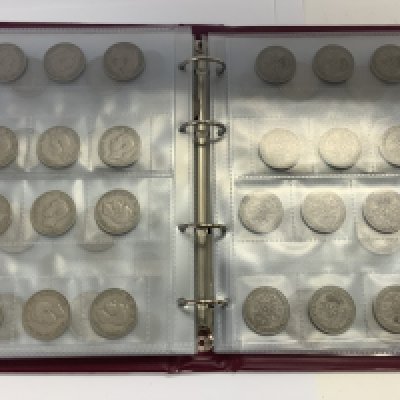 An album of mostly British coinage including some pre 1947 coinage. (B)