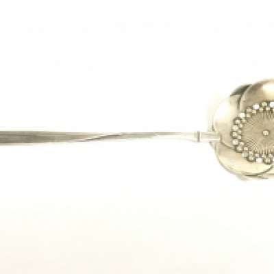 A Japanese silver straining spoon, 15cm long postage category a