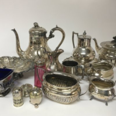 A collection of Victorian and later silver plate a tea set dish tray and other ornaments.