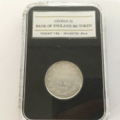 A George III Quarter Sovereign. Postage category B