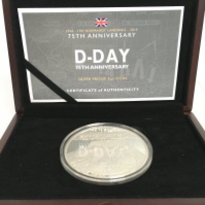 A 2019 D-Day 75th Anniversary silver proof 5oz coin. Postage category B