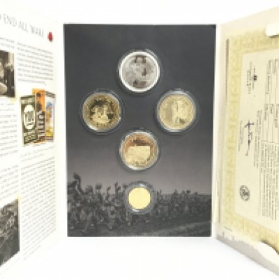 A War To End All Wars 1914+1918 coin pack including The WW1 Centenary Lone Soldier 9ct Gold Coin. Postage category B