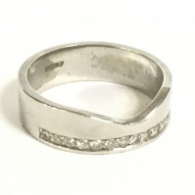 A Platinum wedding band , 6.6g. Size K/L Postage category A
