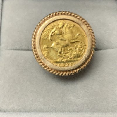 A 1925 South African mint George V half Sovereign and ring mount . 8.1g, (A)