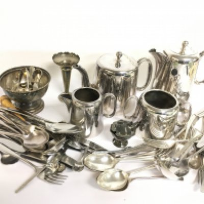 A collection of silver plated items including cutlery, four piece tea set etc. This lot cannot be posted
