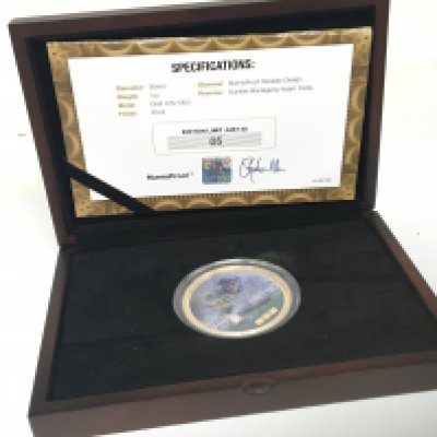 A Gold 9carat limited edition one ounce enamel decorated coin The Dunkirk Montage 5/50 with certificate of Authenticity.