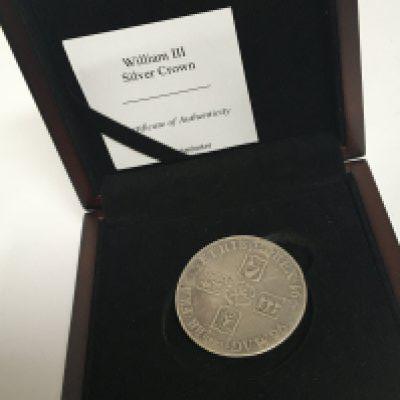 A William III 1695-1700 Silver Crown with certificate of Authenticity.