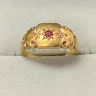An antique 18ct gold ruby and diamond ring, Size L. (A)