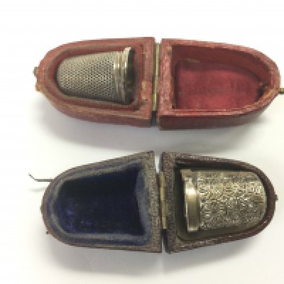 Two late Victorian silver thimbles including a Charles Horner example. Shipping category A.