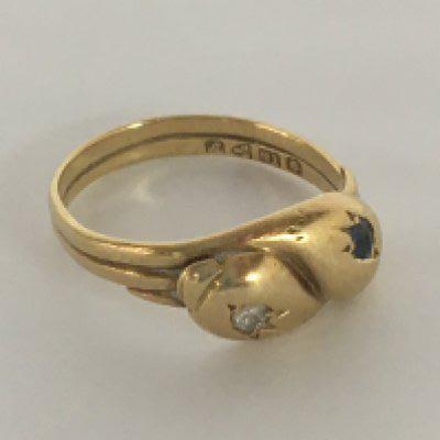 An 18carat gold ring set with a small diamond weight 3.5g