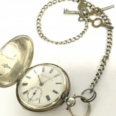 A vintage silver hallmarked T Gaunt Melbourne & Sydney pocket watch with chain and key (seen working). This lot cannot be posted