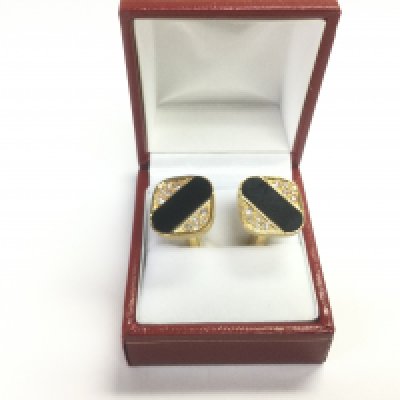 A pair of 18ct gold and diamond cufflinks, approx 13.8g. Shipping category B.