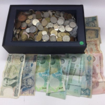 A box of foreign coins and banknotes. Shipping category D.