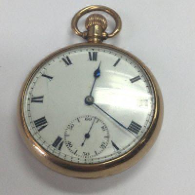 A 9 ct gold button wind pocket watch the enamel dial with with Roman numerals and second subsidiary dial .