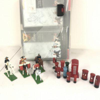 A Small Collection Of loose Britains Figures And A Collection Of Britains Catalogs. No Reserve.
