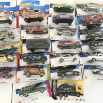 A Box Containing Hotwheels And Matchbox Diecast.