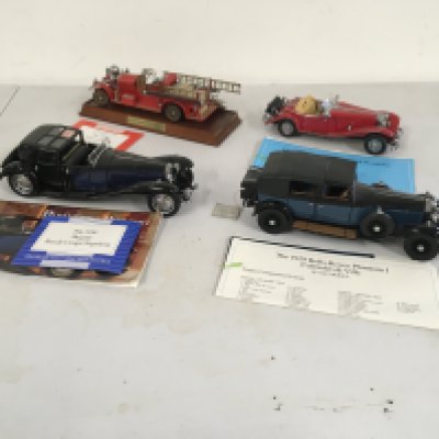 4 x Franklin Mint model cars in 1..24 scale featuring 
1934 Mercedes 500k special roadsterâ€¦1929 Roll Royce Phantom 1 Cabriolet de Ville..  1930 Bugatti Royale Coupe Napoleon and 1922 Ahrens Fox RK4 Pumper. No reserve