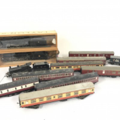 A Box Containing 3 x 00 Gauge Locomotives Coaches And Wagons. No Reserve.