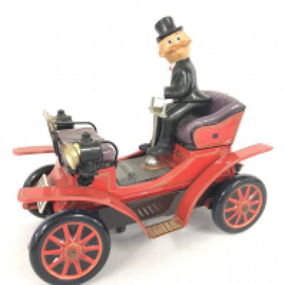 A Tin plate Battery Operated Cragstan Shaking Antique Car. No Reserve.