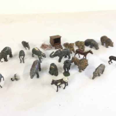 A collection of 20 metal animals featuring farm and jungle creatures by Britains etc.  no reserve
