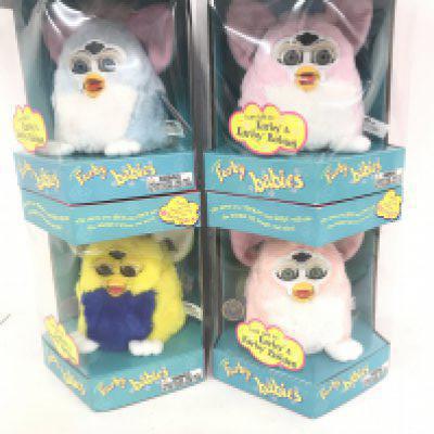 4 Boxed And Sealed Tiger/Hasbro Furby Babies. Including Baby Pink. Primary. Baby Blue And One Other.