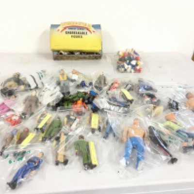 A collection of action figures predominantly featuring The A Team and Ghostbusters.  Also includes retailers box of Lone Star unbreakable figures featuring Scaracens.   Plus a small bag of Smurfs. No reserve